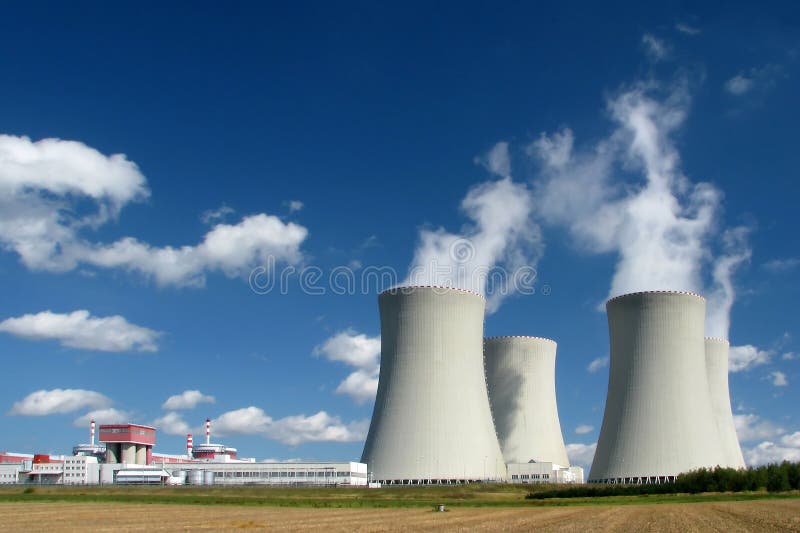 Smoking nuclear power plant in sunny day. Smoking nuclear power plant in sunny day.