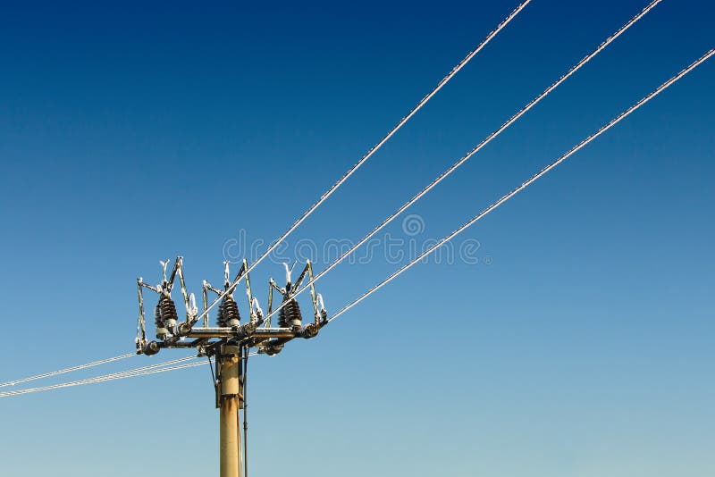 Detail of power pole and blue background. Detail of power pole and blue background