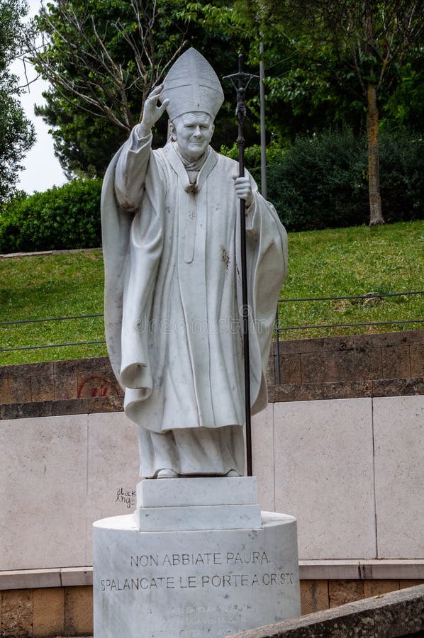 italy.  matera.  pope john paul , work of 2011 by the italian sculptor carlo andrei.. the statue,  from a  block of 5 tons of white carrara marble, is 220 cm high and weighs over 2 tons.  the monument was erected in 2011 inside the boschetto, the wooded park that the city had already dedicated and  after the holy father.  the installation of the statue took place on the 20th anniversary of the pope&#x27;s historic visit to the city of matera on april , 1991. the words of pope john paul 2 ° are engraved in the circular marble basement  not be afraid. open the ors wide to  christ,  karol jozef wojtyla, bishop of rome, catholic church, blessing, pastoral visit, gesture of blessing, blessing pope, popes, second, 2nd, cross, pastoral, , art, , religion, saint, vatican, catholicism, basilicata, lucania, pilgrim, pilgrimage. italy.  matera.  pope john paul , work of 2011 by the italian sculptor carlo andrei.. the statue,  from a  block of 5 tons of white carrara marble, is 220 cm high and weighs over 2 tons.  the monument was erected in 2011 inside the boschetto, the wooded park that the city had already dedicated and  after the holy father.  the installation of the statue took place on the 20th anniversary of the pope&#x27;s historic visit to the city of matera on april , 1991. the words of pope john paul 2 ° are engraved in the circular marble basement  not be afraid. open the ors wide to  christ,  karol jozef wojtyla, bishop of rome, catholic church, blessing, pastoral visit, gesture of blessing, blessing pope, popes, second, 2nd, cross, pastoral, , art, , religion, saint, vatican, catholicism, basilicata, lucania, pilgrim, pilgrimage