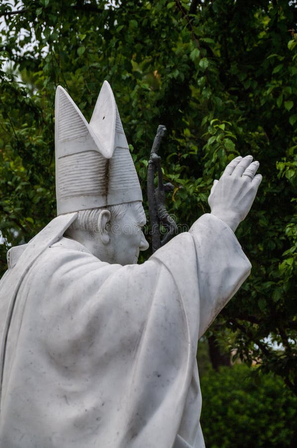 Italy.  matera.  pope john paul , work of 2011 by the italian sculptor carlo andrei.. the statue,  from a  block of 5 tons of white carrara marble, is 220 cm high and weighs over 2 tons.  the monument was erected in 2011 inside the boschetto, the wooded park that the city had already dedicated and  after the holy father.  the installation of the statue took place on the 20th anniversary of the pope`s historic visit to the city of matera on april , 1991. the words of pope john paul 2 ° are engraved in the circular marble basement  not be afraid. open the ors wide to  christ,  karol jozef wojtyla, bishop of rome, catholic church, blessing, pastoral visit, gesture of blessing, blessing pope, popes, second, 2nd, cross, pastoral, , art, , religion, saint, vatican, catholicism, basilicata, lucania, pilgrim, pilgrimage. Italy.  matera.  pope john paul , work of 2011 by the italian sculptor carlo andrei.. the statue,  from a  block of 5 tons of white carrara marble, is 220 cm high and weighs over 2 tons.  the monument was erected in 2011 inside the boschetto, the wooded park that the city had already dedicated and  after the holy father.  the installation of the statue took place on the 20th anniversary of the pope`s historic visit to the city of matera on april , 1991. the words of pope john paul 2 ° are engraved in the circular marble basement  not be afraid. open the ors wide to  christ,  karol jozef wojtyla, bishop of rome, catholic church, blessing, pastoral visit, gesture of blessing, blessing pope, popes, second, 2nd, cross, pastoral, , art, , religion, saint, vatican, catholicism, basilicata, lucania, pilgrim, pilgrimage