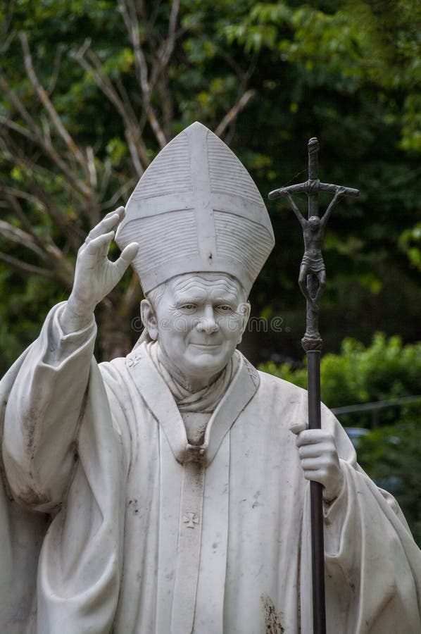 Italy.  matera.  pope john paul , work of 2011 by the italian sculptor carlo andrei.. the statue,  from a  block of 5 tons of white carrara marble, is 220 cm high and weighs over 2 tons.  the monument was erected in 2011 inside the boschetto, the wooded park that the city had already dedicated and  after the holy father.  the installation of the statue took place on the 20th anniversary of the pope`s historic visit to the city of matera on april , 1991. the words of pope john paul 2 ° are engraved in the circular marble basement  not be afraid. open the ors wide to  christ,  karol jozef wojtyla, bishop of rome, catholic church, blessing, pastoral visit, gesture of blessing, blessing pope, popes, second, 2nd, cross, pastoral, , art, , religion, saint, vatican, catholicism, basilicata, lucania, pilgrim, pilgrimage. Italy.  matera.  pope john paul , work of 2011 by the italian sculptor carlo andrei.. the statue,  from a  block of 5 tons of white carrara marble, is 220 cm high and weighs over 2 tons.  the monument was erected in 2011 inside the boschetto, the wooded park that the city had already dedicated and  after the holy father.  the installation of the statue took place on the 20th anniversary of the pope`s historic visit to the city of matera on april , 1991. the words of pope john paul 2 ° are engraved in the circular marble basement  not be afraid. open the ors wide to  christ,  karol jozef wojtyla, bishop of rome, catholic church, blessing, pastoral visit, gesture of blessing, blessing pope, popes, second, 2nd, cross, pastoral, , art, , religion, saint, vatican, catholicism, basilicata, lucania, pilgrim, pilgrimage