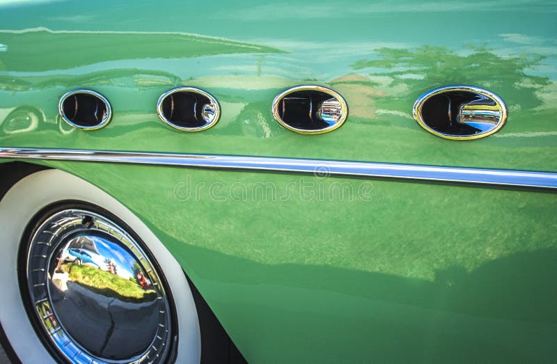 Side view of front fender of a 1950s Classic Car. Side view of front fender of a 1950s Classic Car.