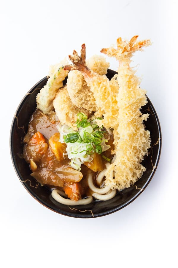 Κάρρυ Udon με το tempura, παχύ νουντλς σίτου στο ιαπωνικό κάρρυ και tempura στοκ εικόνα με δικαίωμα ελεύθερης χρήσης Κάρρυ Udon με το tempura, παχύ νουντλς σίτου στο ιαπωνικό κάρρυ και tempura στοκ εικόνα με δικαίωμα ελεύθερης χρήσης