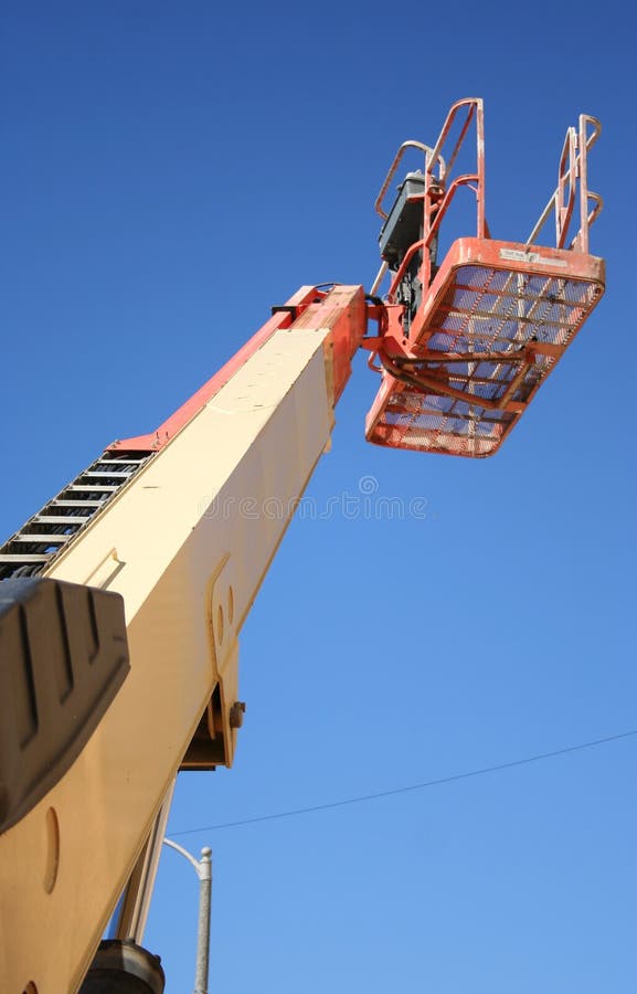 Empty unused cherry picker viewed from below. Empty unused cherry picker viewed from below