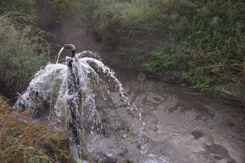 Clear sweet and health water overflowing from the water jet on rainy days,. Clear sweet and health water overflowing from the water jet on rainy days,