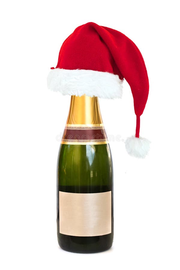 Καπέλο Χριστουγέννων σε ένα μπουκάλι CHAMPAGNE με την κενή ετικέτα στο λευκό στοκ εικόνες με δικαίωμα ελεύθερης χρήσης