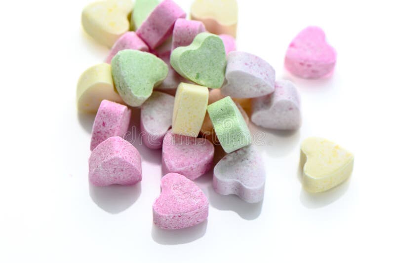 multi-colored small heart-shaped candies 2. multi-colored small heart-shaped candies 2