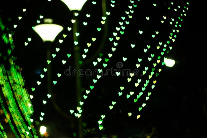 Καρδιά που διαμορφώνεται bokeh στο απομονωμένο μαύρο υπόβαθρο έτοιμο για την επικάλυψη σχεδίου σας στοκ εικόνα με δικαίωμα ελεύθερης χρήσης Καρδιά που διαμορφώνεται bokeh στο απομονωμένο μαύρο υπόβαθρο έτοιμο για την επικάλυψη σχεδίου σας στοκ εικόνα με δικαίωμα ελεύθερης χρήσης