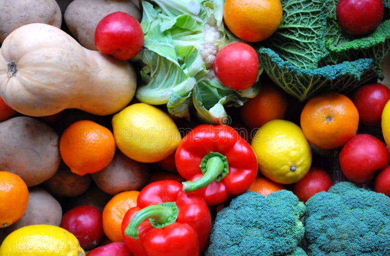 A variety of fruit and veg; oranges, lemons, plums, broccoli, potatoes. A variety of fruit and veg; oranges, lemons, plums, broccoli, potatoes