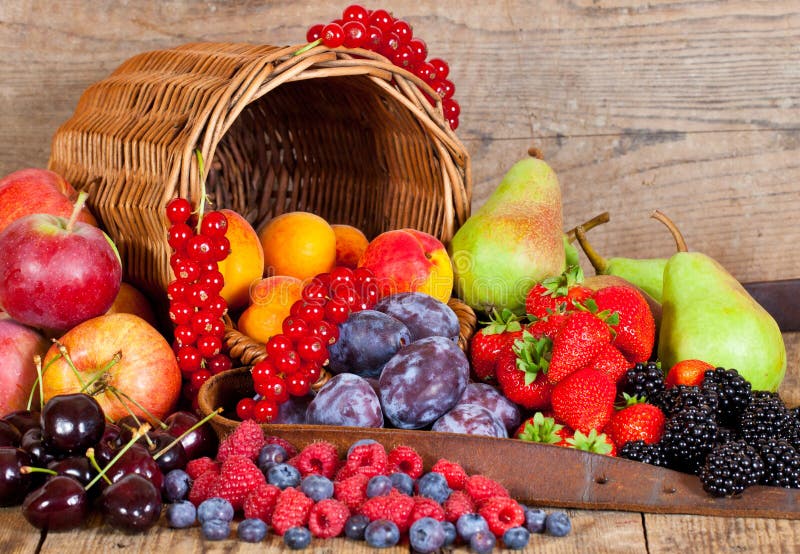 A fresh Fruit Basket with European Fruits in Summer. A fresh Fruit Basket with European Fruits in Summer