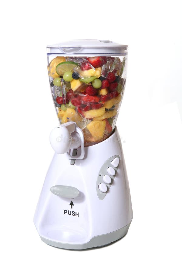 Colorful fruit and ice in a blender. Colorful fruit and ice in a blender