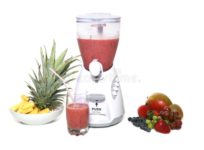 Colorful fruit and ice in a blender. Colorful fruit and ice in a blender