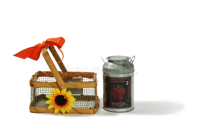 Basket made of wire and wood with a bow and a daisy, Old Fashioned milk tin with country charm. Basket made of wire and wood with a bow and a daisy, Old Fashioned milk tin with country charm