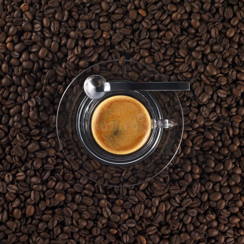 Glass coffee cup with fresh made espresso (black background). Glass coffee cup with fresh made espresso (black background)