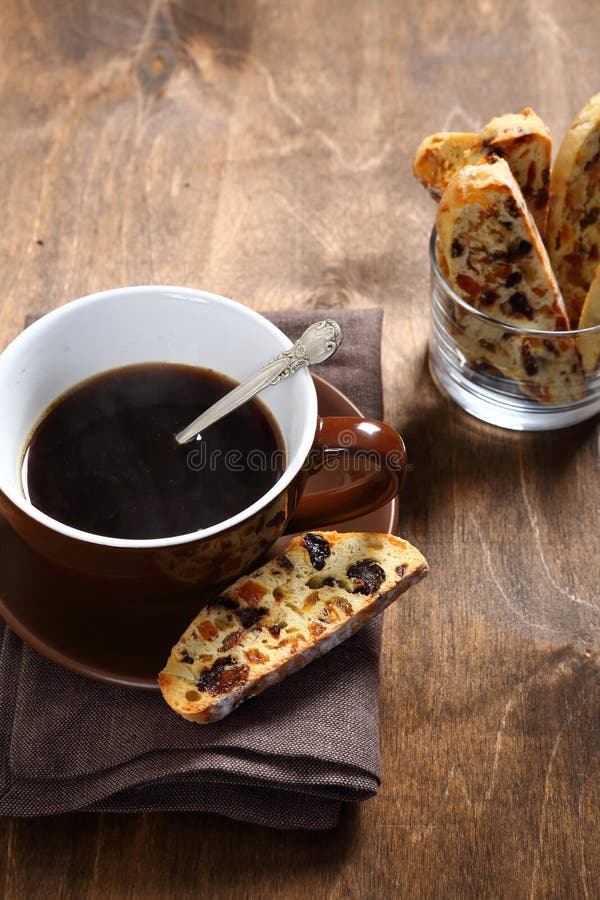 Καφές και biscotti στους πίνακες στοκ εικόνα Καφές και biscotti στους πίνακες στοκ εικόνα