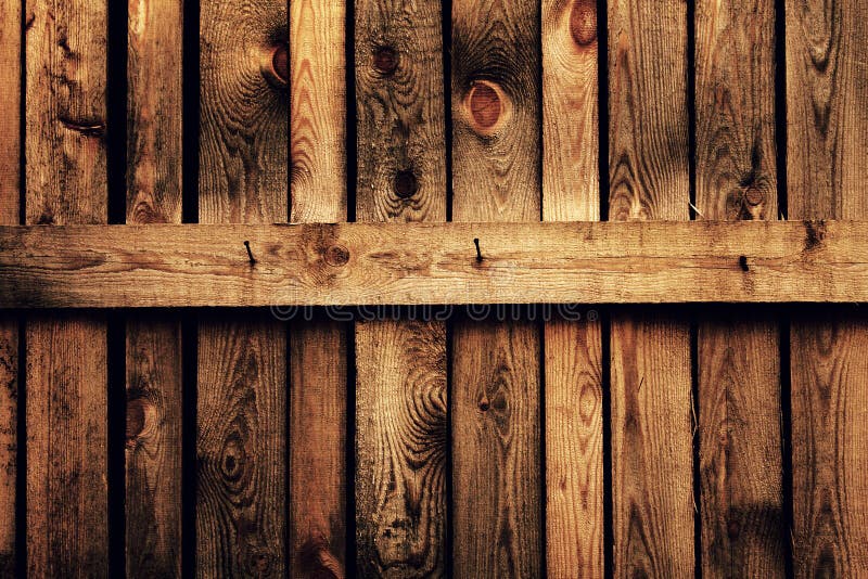 Old brown wood fence background. Old brown wood fence background