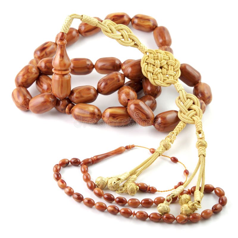 Καφετιές χρωματισμένες πολύ μεγάλες rosary χάντρες μικρή που απομονώνεται με στο λευκό στοκ εικόνα Καφετιές χρωματισμένες πολύ μεγάλες rosary χάντρες μικρή που απομονώνεται με στο λευκό στοκ εικόνα