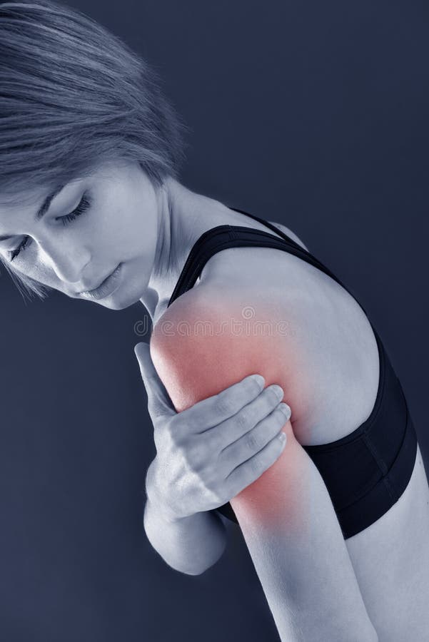 Closeup of fitness girl with biceps pain, isolated. Closeup of fitness girl with biceps pain, isolated