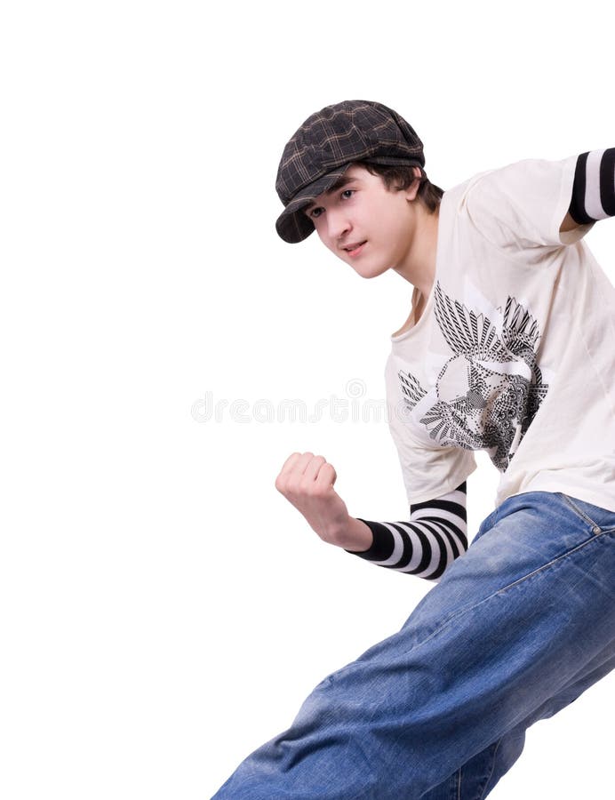 Teenage boy dancing Locking or Hip-hop dance over isolated background. Teenage boy dancing Locking or Hip-hop dance over isolated background