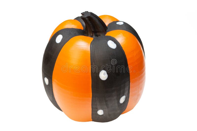 Pumpkin for halloween on a white background. Isolated. Black, orange stripes and white dots. Pumpkin for halloween on a white background. Isolated. Black, orange stripes and white dots