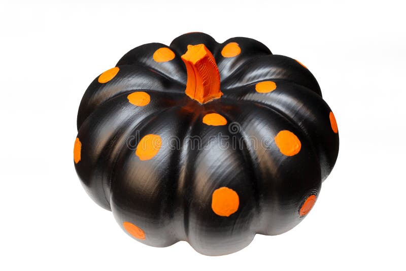 Pumpkin for halloween on a white background. isolated. Black pumpkin with orange dots. Top view. Pumpkin for halloween on a white background. isolated. Black pumpkin with orange dots. Top view