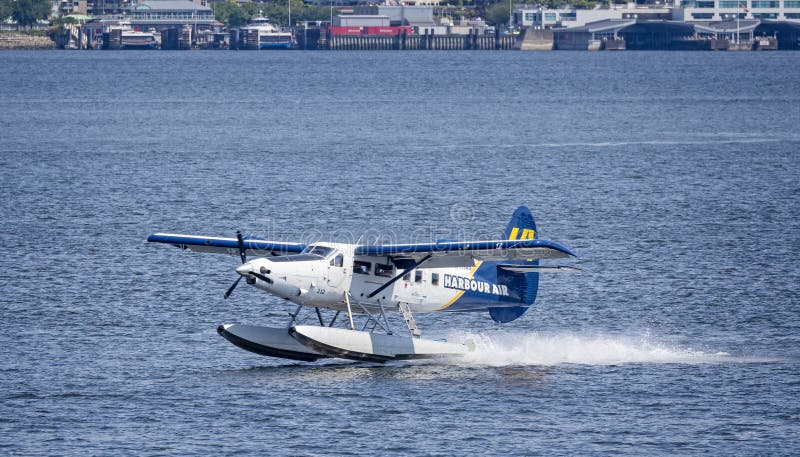 Close up of a Harbour Air seaplane landing in the harbour in Vancouver, British Columbia, Canada on 1 June 2023. Close up of a Harbour Air seaplane landing in the harbour in Vancouver, British Columbia, Canada on 1 June 2023