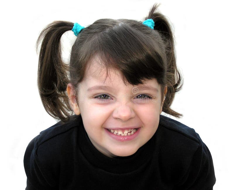 Portrait of a little girl laughing to the camera. Portrait of a little girl laughing to the camera.