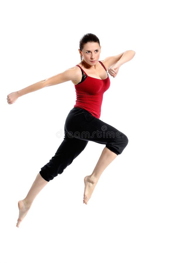 κορίτσι που πηδά πέρα από sportswear το λευκό στοκ εικόνα με δικαίωμα ελεύθερης χρήσης κορίτσι που πηδά πέρα από sportswear το λευκό στοκ εικόνα με δικαίωμα ελεύθερης χρήσης
