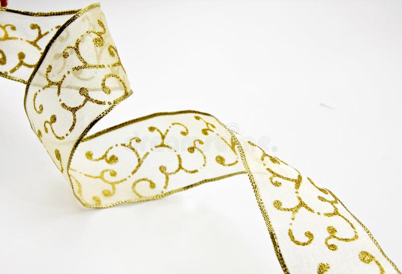 A golden ribbon on white. A golden ribbon on white