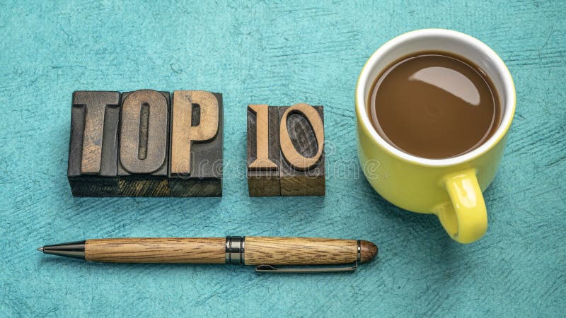 Top 10 word abstract in vintage letterpress wood type with a cup of coffee, review and selection. Top 10 word abstract in vintage letterpress wood type with a cup of coffee, review and selection