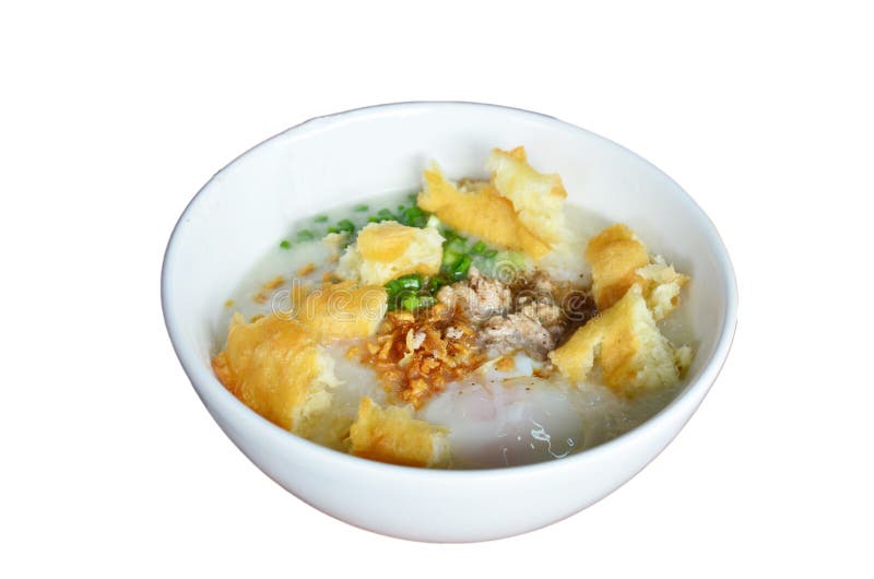 Κουάκερ ή Congee ρυζιού με το λευκό που τσιγαρίζεται doughstick ή το κέικ σφουγγαριών ζάχαρης στοκ φωτογραφίες με δικαίωμα ελεύθερης χρήσης Κουάκερ ή Congee ρυζιού με το λευκό που τσιγαρίζεται doughstick ή το κέικ σφουγγαριών ζάχαρης στοκ φωτογραφίες με δικαίωμα ελεύθερης χρήσης