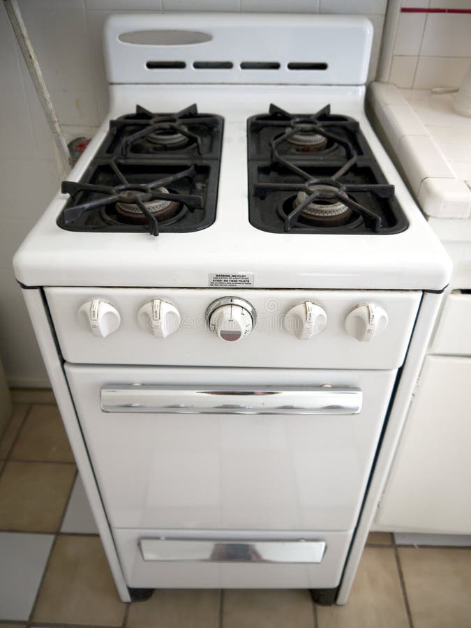 Retro white stove in 1950s kitchen. Retro white stove in 1950s kitchen