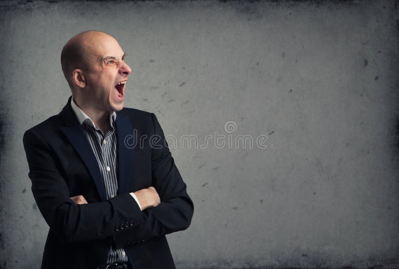 Portrait of a young man screaming. Portrait of a young man screaming