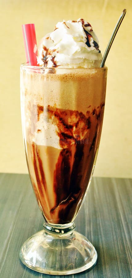 Cold coffee with ice cream at cafe. Cold coffee with ice cream at cafe