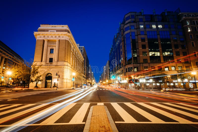 Buildings and traffic along H Street at night, in Washington, DC. Buildings and traffic along H Street at night, in Washington, DC.