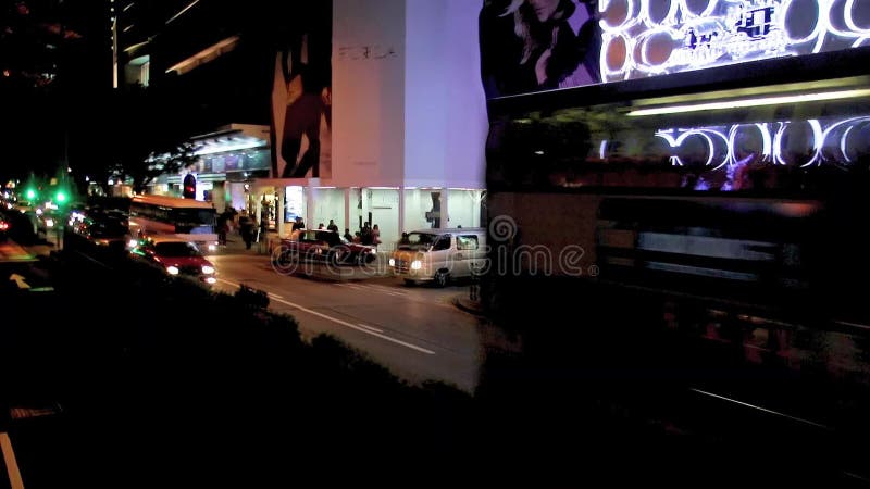 Κυκλοφορία νύχτας σε μια οδό στη νύχτα Kowloon φιλμ μικρού μήκους