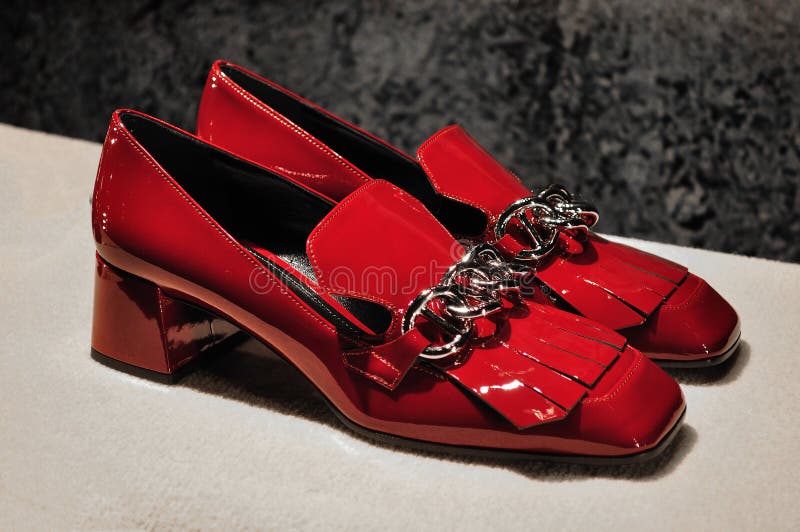 Prada Red women lacquer shoes with chain and tassels the heels height is low to medium ... the shoes are beautiful glossy high-fashion . Prada Red women lacquer shoes with chain and tassels the heels height is low to medium ... the shoes are beautiful glossy high-fashion ...