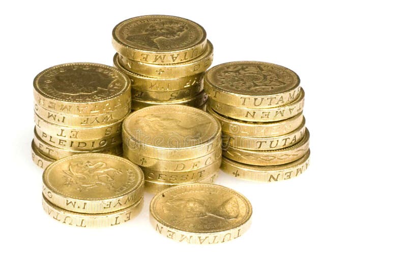 Stacks of british pound coin on a white background. Stacks of british pound coin on a white background
