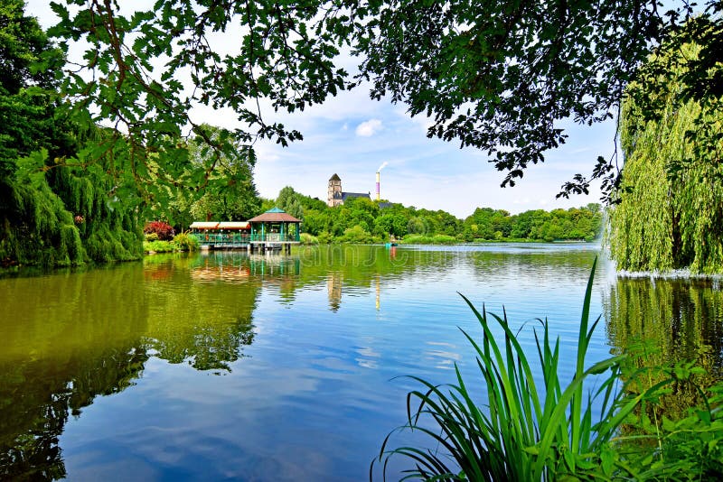 Pond `Schlossteich` in Chemnitz Germany in the morning sun. Pond `Schlossteich` in Chemnitz Germany in the morning sun