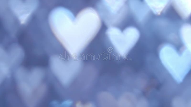 λαμπύρισμα με σχήμα καρδιάς, με λάμψη σε απαλό μπλε φόντο. ρομαντικά βαλεντίνοι φόντο ημέρας απεικόνιση αποθεμάτων