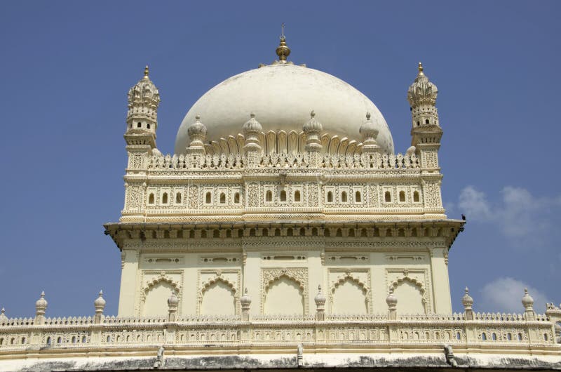 Carving details on outer wall of the Gumbaz, Muslim Mausoleum of Sultan Tipu And His Relatives, Srirangapatna, Karnataka, India. Carving details on outer wall of the Gumbaz, Muslim Mausoleum of Sultan Tipu And His Relatives, Srirangapatna, Karnataka, India