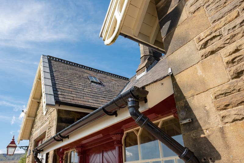 Detailed view of an old-style Railway Station booking office and waiting room set in the North York Dales. The fine stonework is clearly evident. Detailed view of an old-style Railway Station booking office and waiting room set in the North York Dales. The fine stonework is clearly evident.