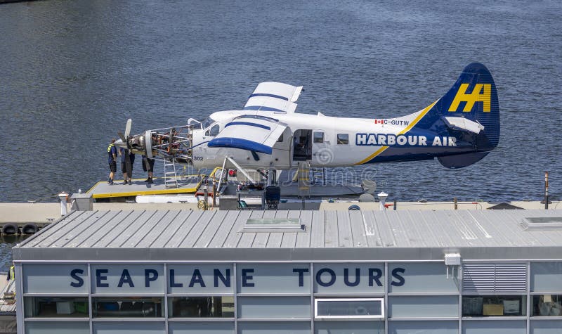 Harbour Air seaplane engine open for maintenance whilst moored at floating terminal in Vancouver, British Columbia, Canada on 1 June 2023. Harbour Air seaplane engine open for maintenance whilst moored at floating terminal in Vancouver, British Columbia, Canada on 1 June 2023