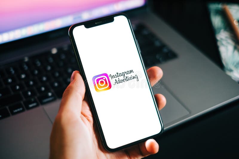 Instagram ads logo on the smartphone screen. High quality photo. Instagram ads logo on the smartphone screen. High quality photo