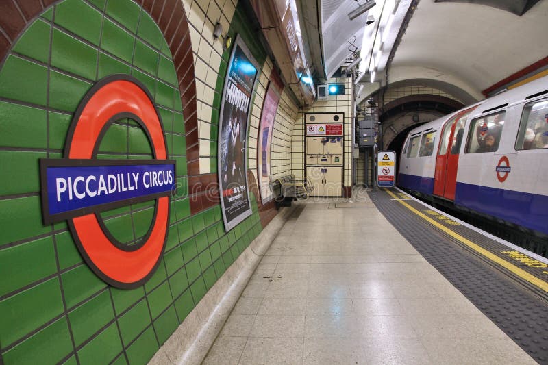 LONDON, UK - MAY 14, 2012: Piccadilly Circus underground station in London. London Underground is the 11th busiest metro system worldwide with 1.1 billion annual rides. LONDON, UK - MAY 14, 2012: Piccadilly Circus underground station in London. London Underground is the 11th busiest metro system worldwide with 1.1 billion annual rides.