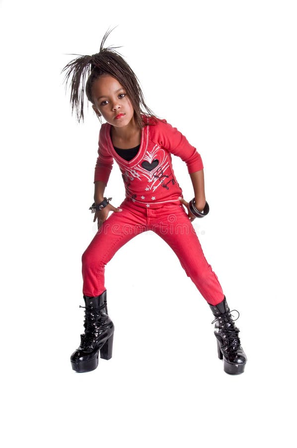 Young African American girl playing dress up like she is a hip hop singer. Young African American girl playing dress up like she is a hip hop singer