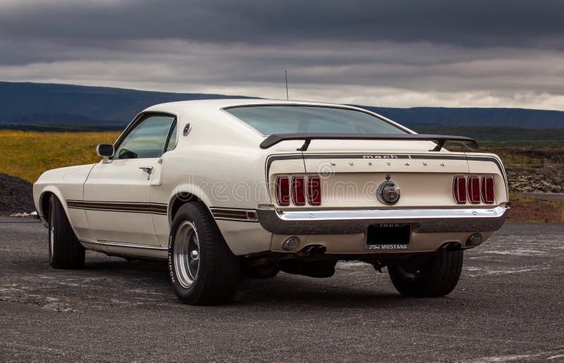 Image of a 1969 Ford Mustang Mach 1 at a drag racing event in Iceland. Image of a 1969 Ford Mustang Mach 1 at a drag racing event in Iceland.