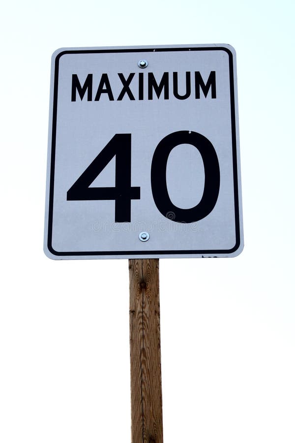 A road sign indicating 40 km/mph speed limit. A road sign indicating 40 km/mph speed limit.