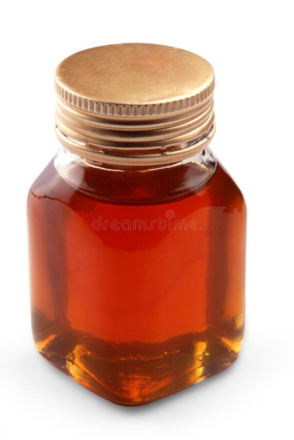 Honey bottle on white background (with clipping path). Honey bottle on white background (with clipping path)