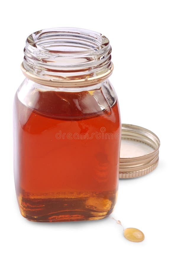 Honey bottle on white background (with clipping path). Honey bottle on white background (with clipping path)